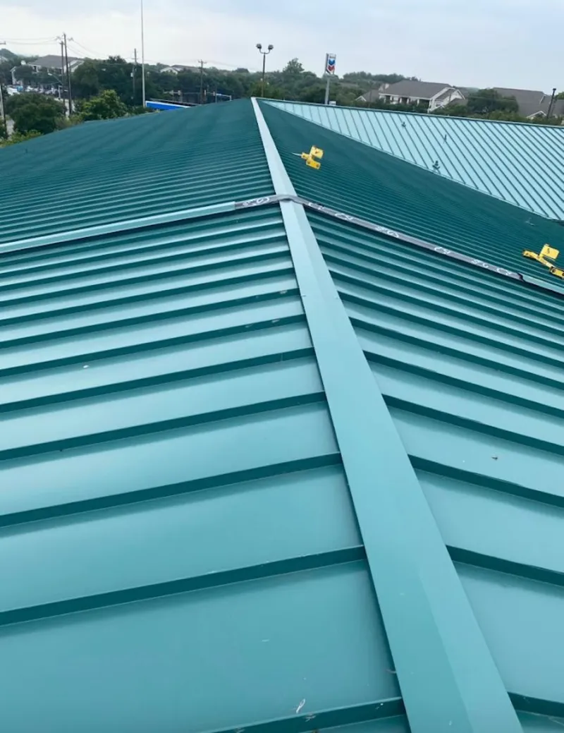 Green commercial metal roof ridge and valley for Metal Roof Repair in Braddock